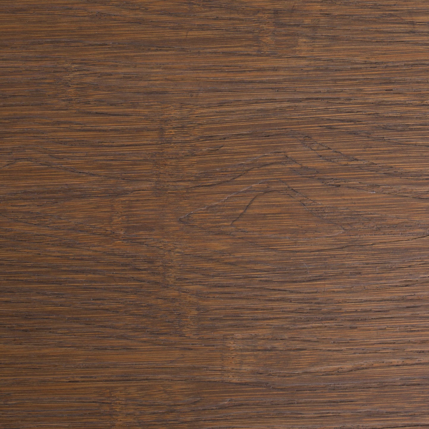 Closeup of the Dakota - Industrial Adjustable Bar / Dinette Table in Antique Brown, featuring a rich brown wooden surface with visible grain patterns and natural texture, showcasing subtle variations in tone.