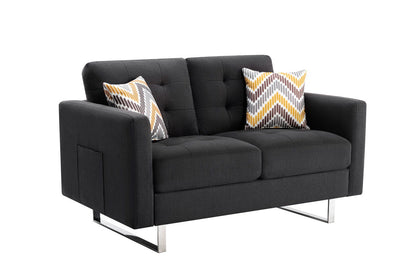 The Victoria loveseat features dark gray linen fabric, metal legs, side pockets, and two accent pillows with yellow, gray, and white chevron designs, shown against a plain white background.