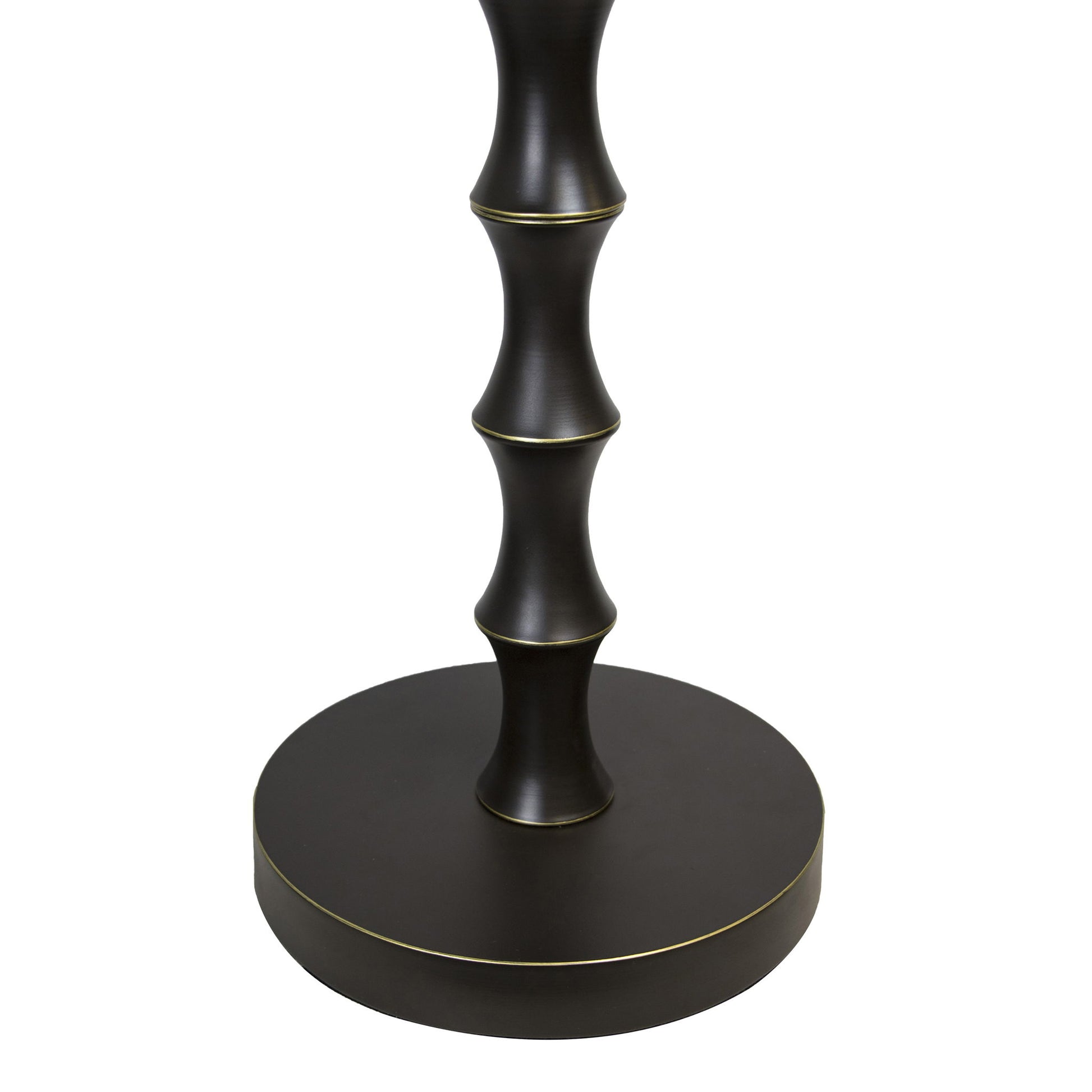 A close-up of the Bora - Contemporary Table lamp base shows its dark metallic, bamboo-like segmented column and round bottom, highlighted with thin gold accents on the edges of the base and segments.