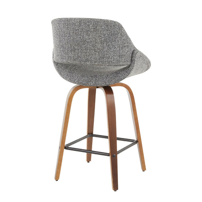 The Fabrico Mid-Century Modern Counter Stool (Set of 2) features a curved gray upholstered backrest, wooden legs, and a black metal footrest, displayed from a rear angled view.