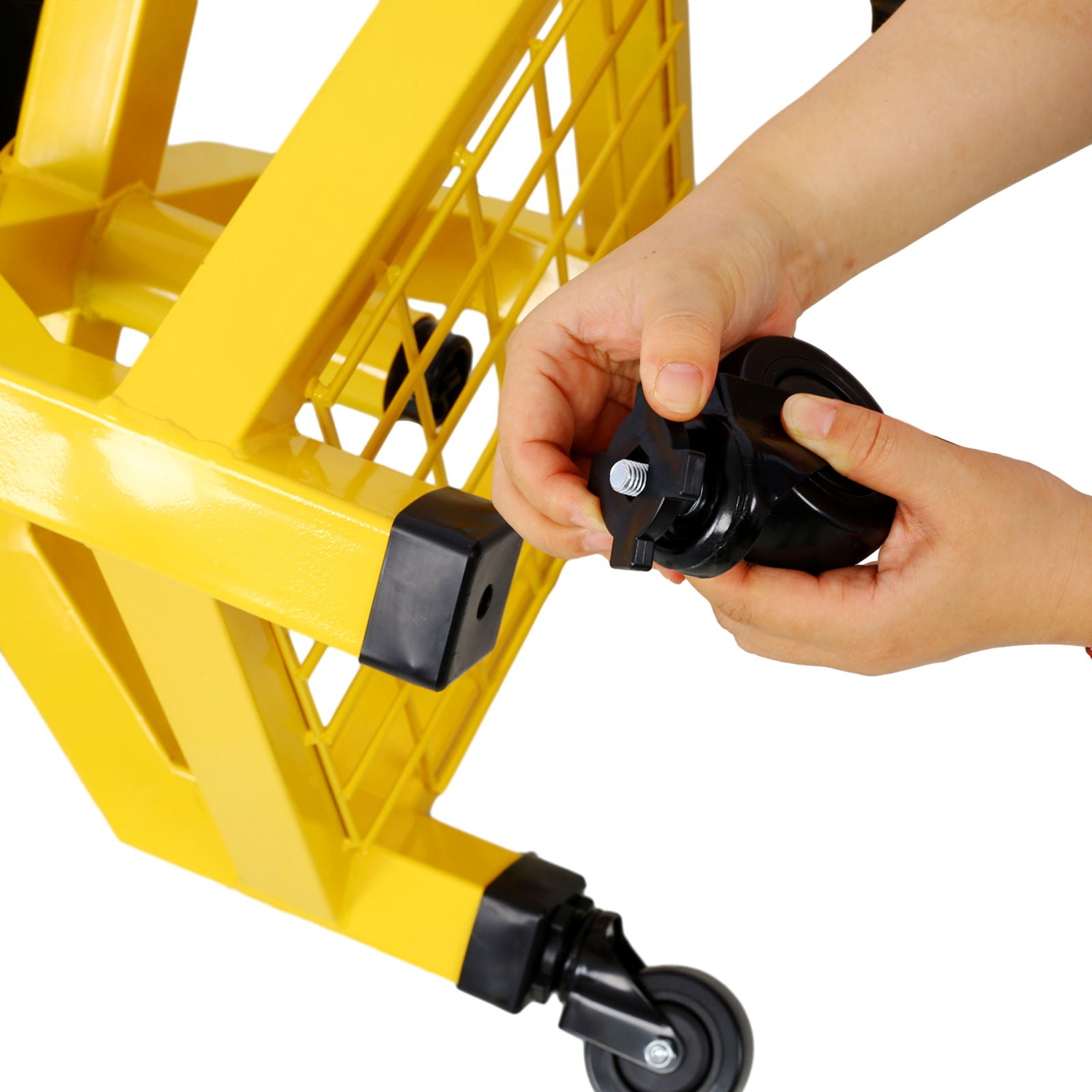 A person’s hands are attaching or adjusting a black caster wheel on a Pneumatic 360 Degree Swivel Stool, Heavy Duty Rolling Mechanics Stool with casters.