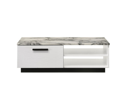 The Matilda Coffee Table features a white faux marble top, one closed cabinet with a black handle on the left, and two open shelves on the right, all in a modern white design, set against a plain white background.