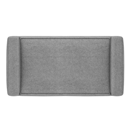 The Scott - Upholstered Ottoman Bench is rectangular with a gray textured fabric surface, cushioned armrests on both sides, and is shown from above.