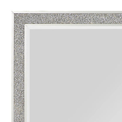 Close-up of the top left corner of the Sliverfluff Mirror in Mirrored/Champagne, showcasing its sparkly champagne-toned frame and light grey reflection.