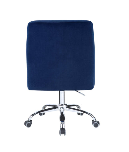 Rear view of the Trenerry Velvet Office Chair in Blue, featuring chrome-metal legs and five rolling casters, with a smooth, soft-textured fabric.