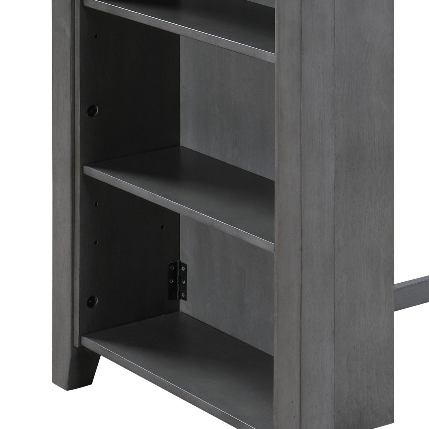 A gray wooden bookshelf, part of the Graham counter height dining table collection, features a simple modern design with three open shelves, standing on a rectangular base with visible hinges inside.