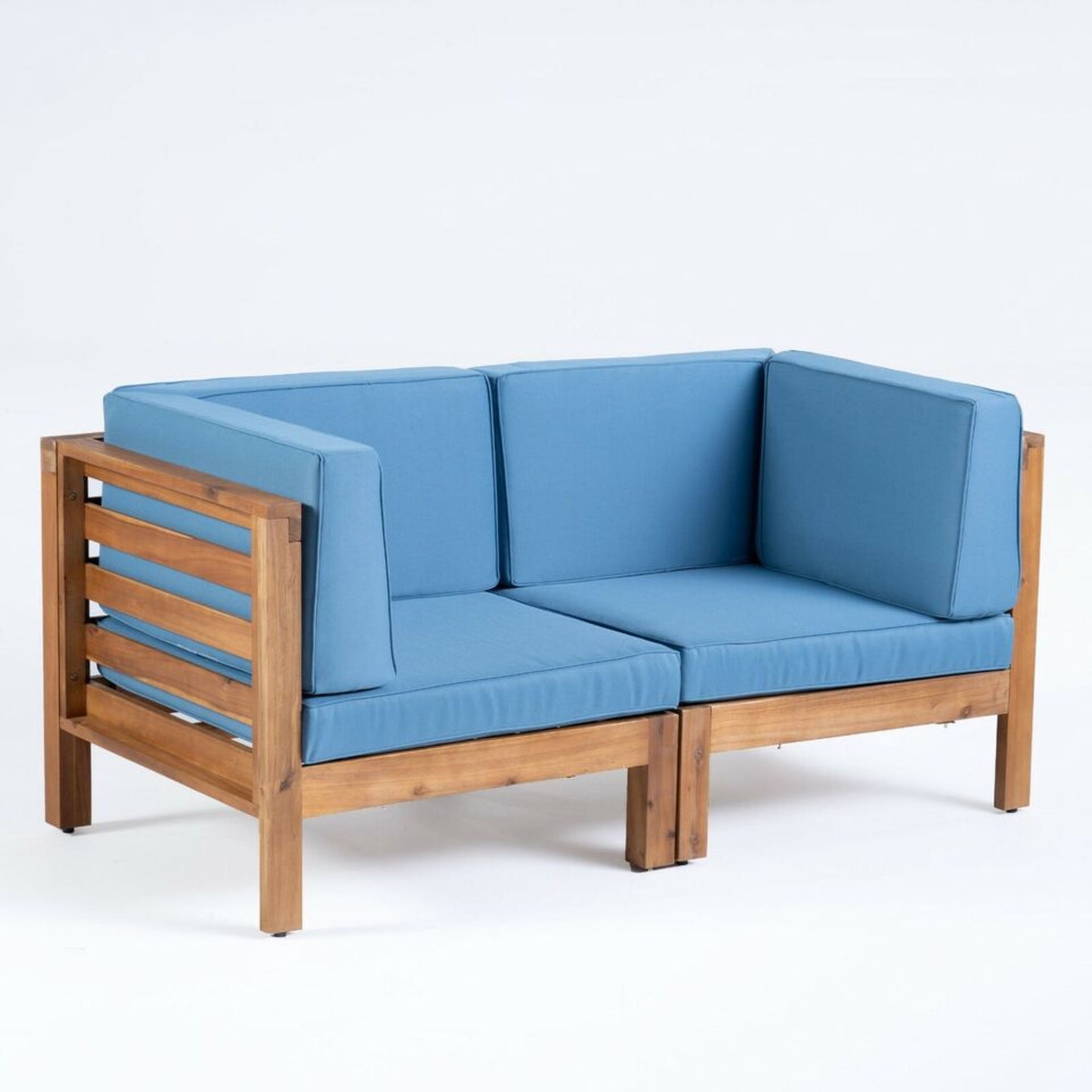 The Oana 2 Piece Loveseat Set features slatted wooden sides and light blue water-resistant cushions with backrests, shown against a plain white background.