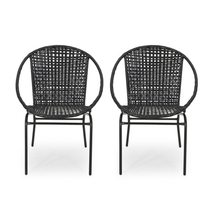 Two Java chairs with comfortable design, featuring black woven rattan, round backs, and metal legs, are placed side by side on a white background.