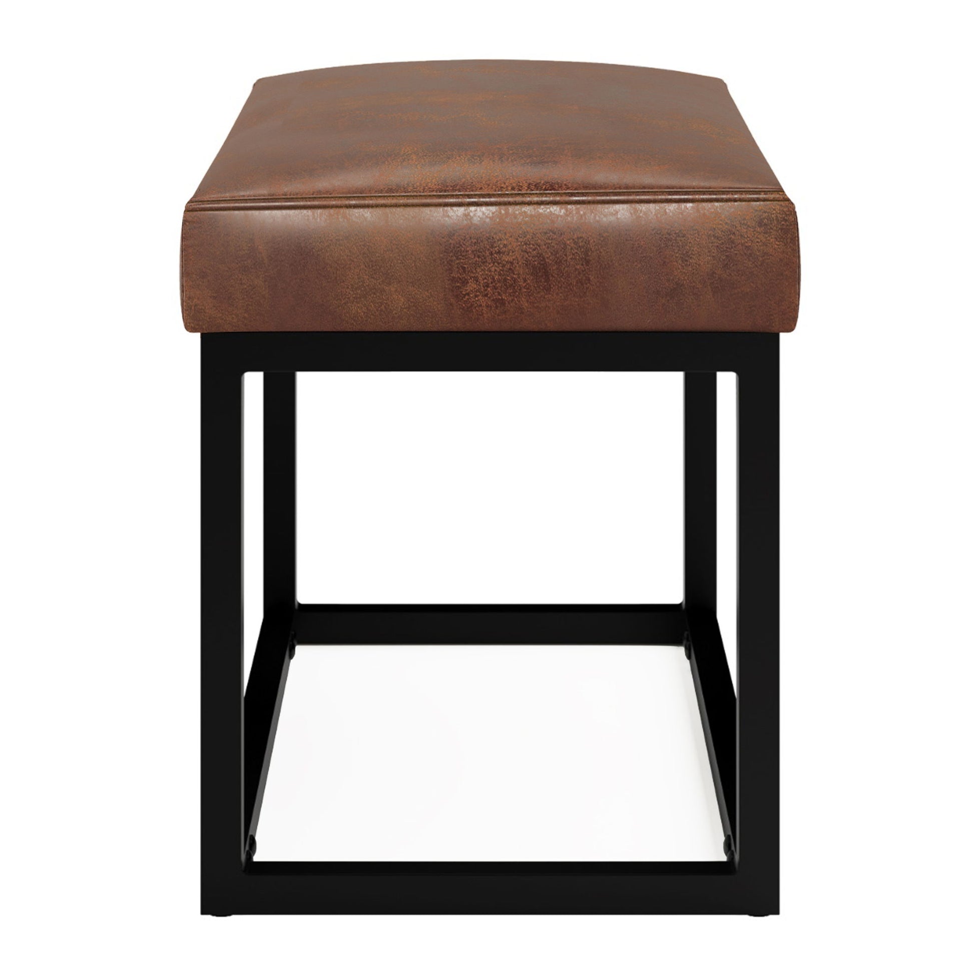 The Reynolds - Small Bench features a distressed saddle brown leather cushioned seat and a sleek black metal frame, shown from the front against a white background.