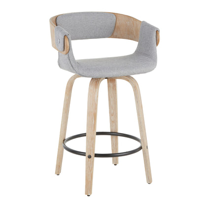 The Elisa Farmhouse Counter Stool (Set of 2) features light wood legs, a round black metal footrest, and a curved gray upholstered seat and backrest with wooden accents in a white washed/gray finish.