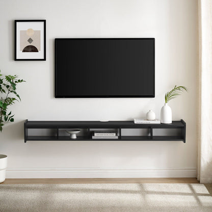 A modern living room with a wall-mounted flat-screen TV on a Modern Wall-Mounted Floating TV Stand, holding books, a bowl, and a plant; plus a framed abstract art print and a green plant in the corner.