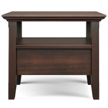 The Acadian Narrow Side Table With Drawer in brown features a rectangular top, an open middle shelf, a closed lower drawer, and simple, sturdy design with slightly tapered legs.
