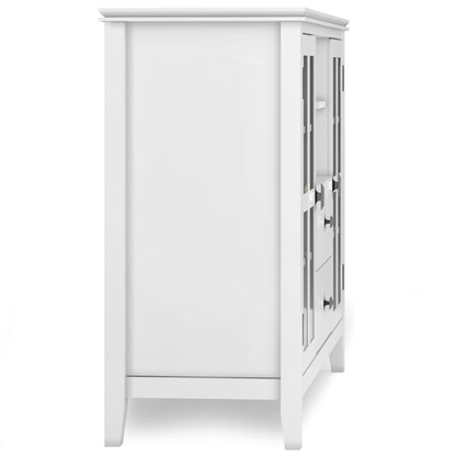 Side view of the Artisan Handcrafted Tall TV Media Stand in white, featuring paneled doors, two drawers with round metal knobs, and four legs, set against a plain white background.