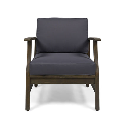 Front view of the Perla - Contemporary Club Chair, featuring straight wooden armrests and modern design, with dark navy blue water-resistant cushions on the seat and back, shown against a white background.