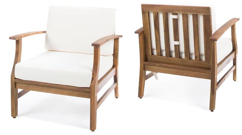Two views of the Perla - Contemporary Club Chair With Water Resistant Cushion: one from the front and side, the other from the back and side. Features a sturdy wooden frame, slatted back design, and light-colored cushions.