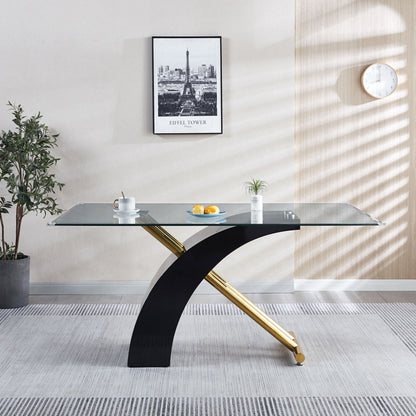 A modern dining room features the Stylish Dining Room Table with a luxury glass top and black legs, accented by a potted plant, framed Eiffel Tower photo, white clock on the wall, and two white coffee cups with lemons and a small plant.