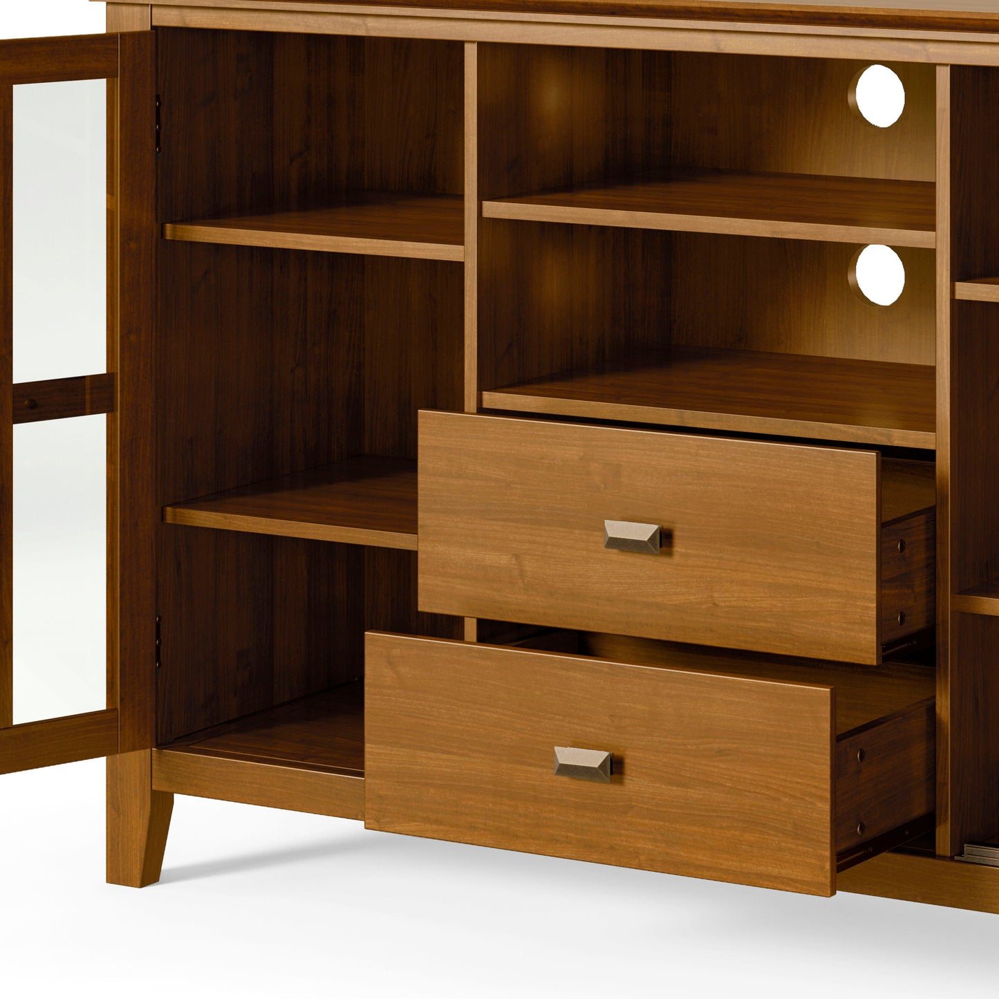 The Artisan Handcrafted Tall TV Media Stand features open shelves, two center drawers with partial openings, a left glass-panel door, and two circular cable management holes at the back.