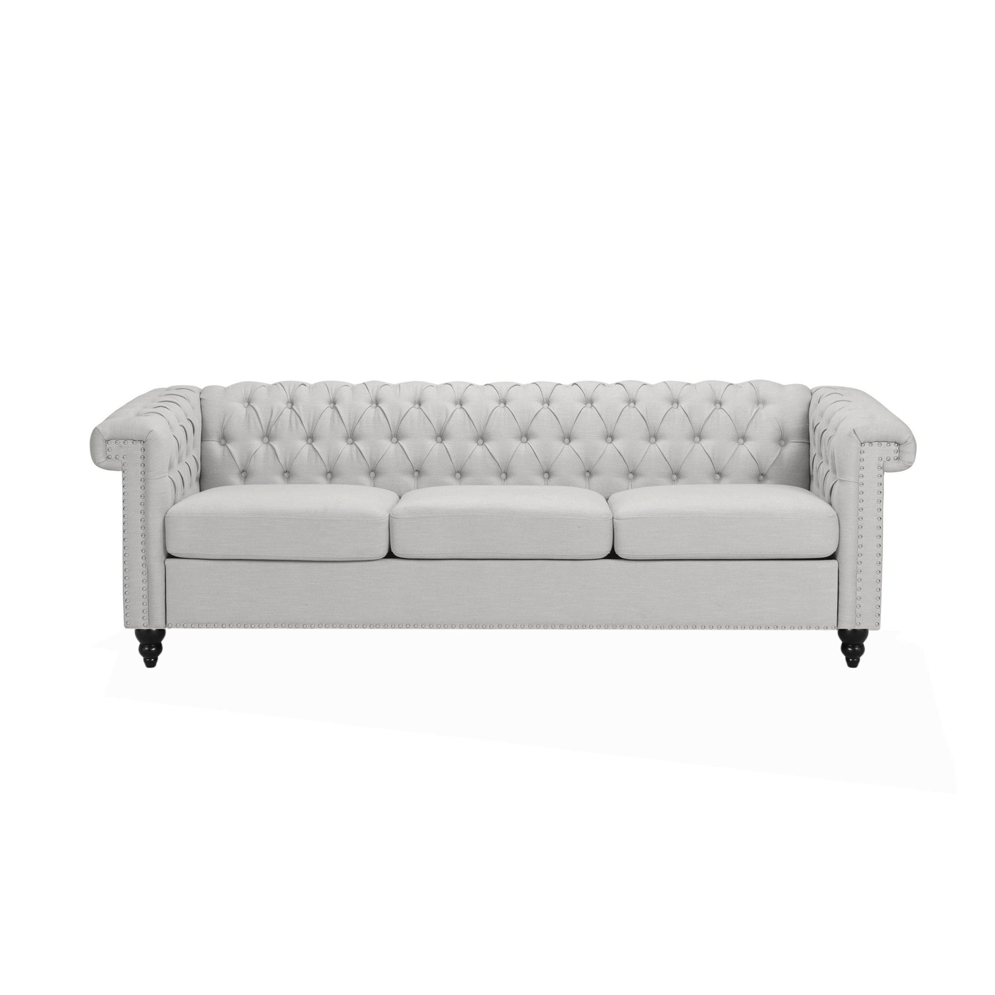 The Chesterfield Style 3 Seater Sofa With Deep Button Tufting features a light gray finish, tufted backrest, rolled arms, and dark wooden legs, shown here against a white background.