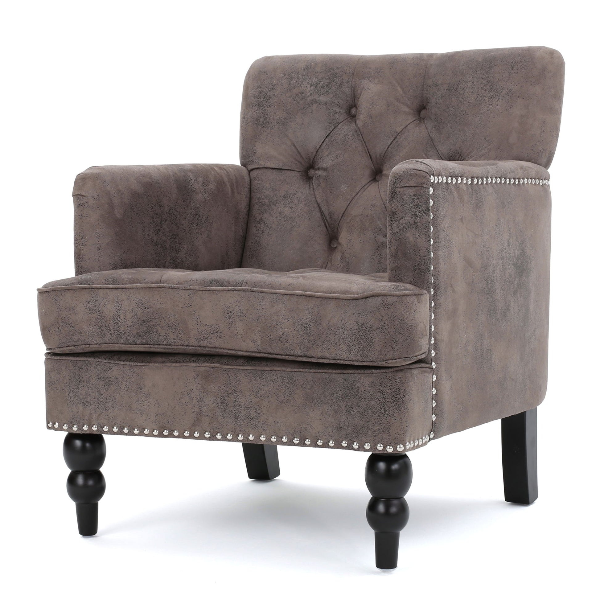 The Vitality Club Chair features a plush gray design with button tufted diamond stitching, studded trim, and elegant black turned legs, displayed against a white background.