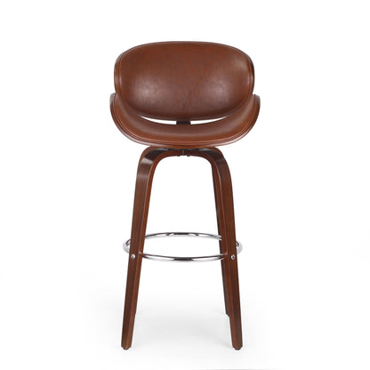 The Lumos - Mid Century Modern Upholstered Swivel Barstool features a curved brown leather seat and backrest, wooden legs, and a circular chrome footrest, shown against a plain white background.