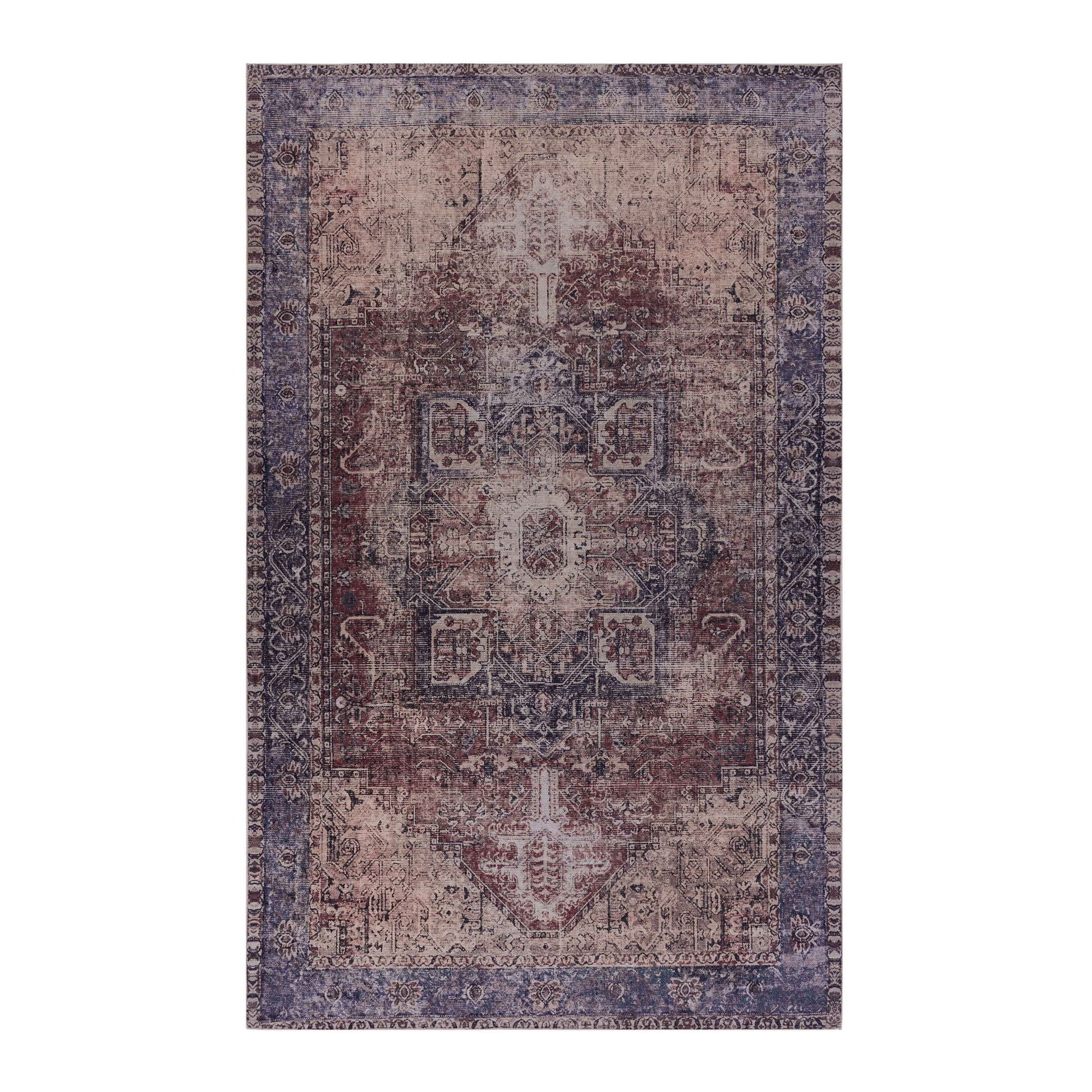 The Maval - Unique Washable Area Rug features a rectangular shape with a faded vintage-style pattern in blue, beige, and burgundy, highlighted by a central medallion and an ornate border.