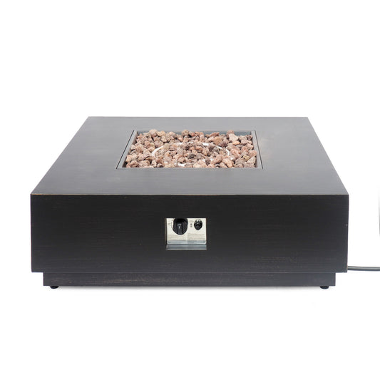 The Modern Square Fire Pit With 50,000 Btu features a sleek black design, metal front control panel, and brown lava rocks on top. A power cord extends from the back for easy operation. Perfect for modern outdoor spaces.