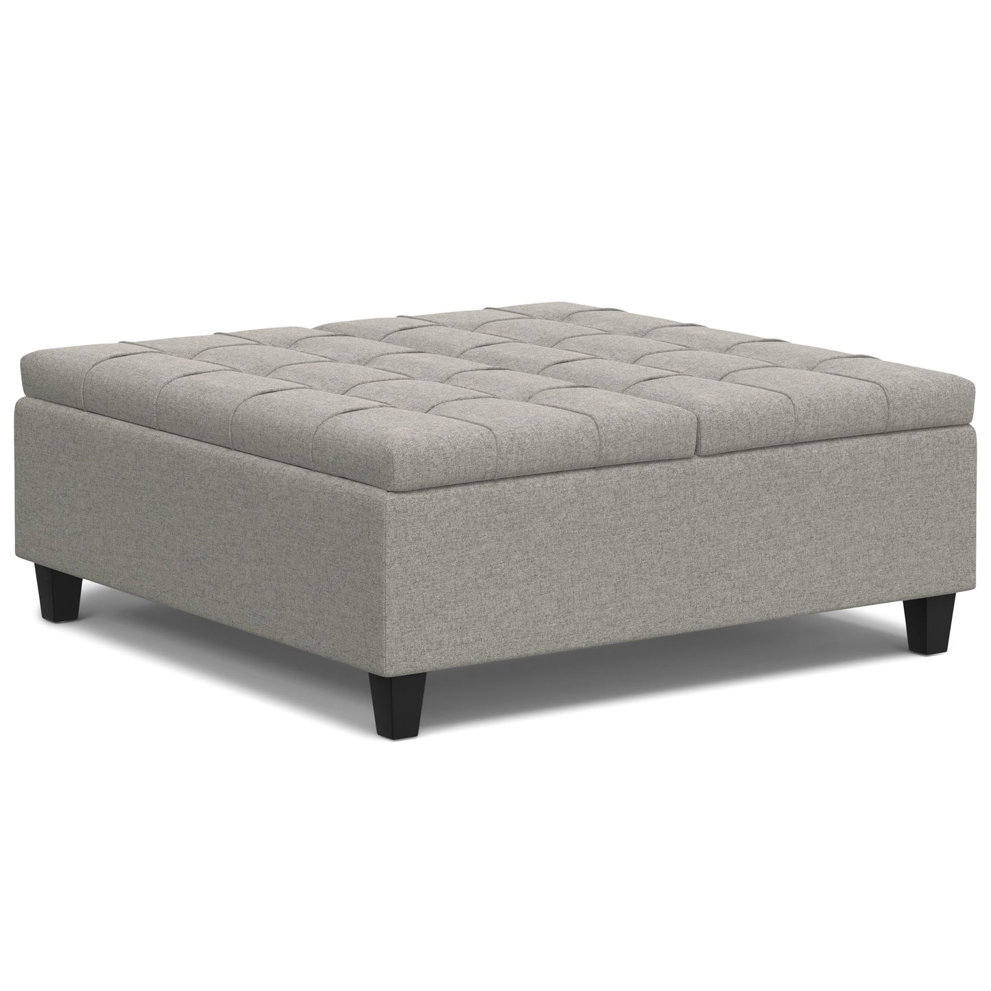 The Harrison - Upholstered Coffee Table Storage Ottoman features a square, light gray tufted top and short black legs, shown against a white background.