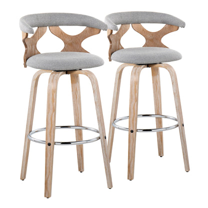 The Gardenia - Contemporary Fixed Height Barstool With Swivel With Round Footrest (Set of 2) features light wood frames, curved backs with geometric cutouts, padded gray fabric seats, and chrome footrests for a stylish modern look.