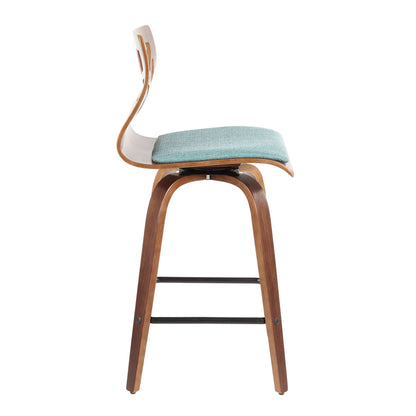 Side view of the Folia Mid Century Modern Fixed Height Counter Stool with swivel, featuring a curved backrest, light green cushioned seat, walnut-finished angled legs, and metal footrest. Sold as a set of 2.