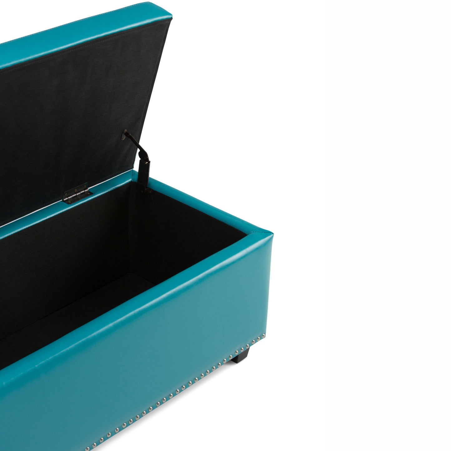 The Hamilton Upholstered Storage Ottoman in teal features a spacious black-lined interior beneath its open lid, metal stud accents along the bottom edge, and stands on short, dark legs.