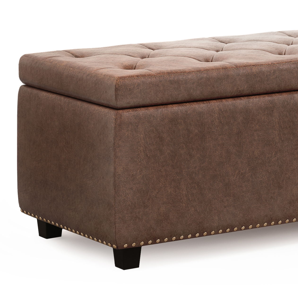The Hamilton Upholstered Storage Ottoman features a brown tufted, cushioned lid, short black legs, and nailhead trim along the bottom edge.
