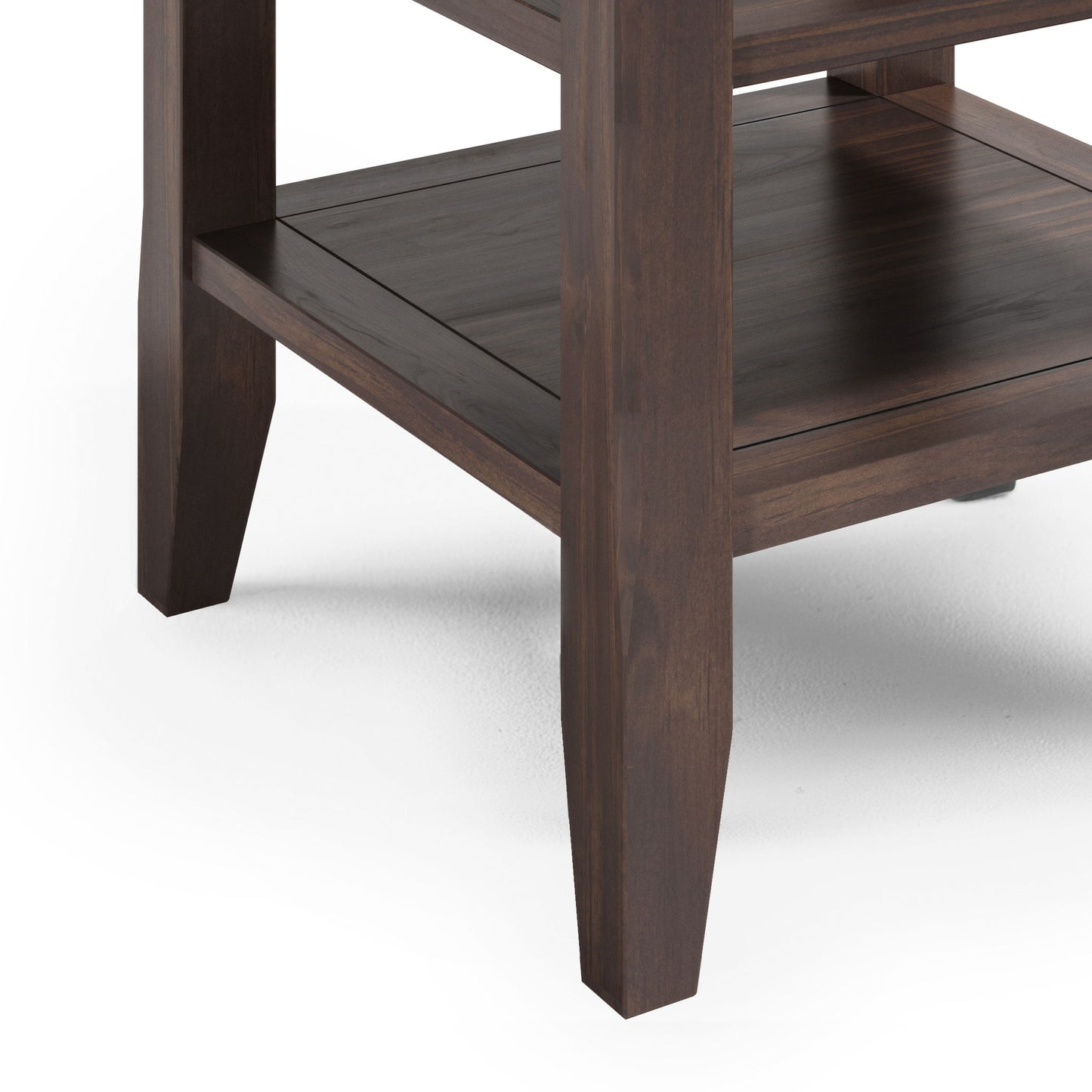 Close-up of the lower section of the Acadian End Table in warm walnut brown, featuring tapered legs and a lower shelf, set against a white background.