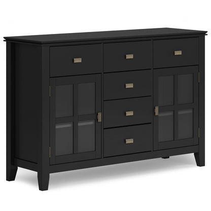 The Artisan - Handcrafted Sideboard Buffet is a black wooden piece with three upper drawers, four central drawers below, two glass-paneled cabinet doors on each side, brass handles, and a modern, sleek design.