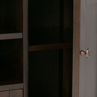 A close-up of the Carlton TV Media Stand shows its empty dark wooden interior with open doors and shelves inside. The right door features a round metal knob.