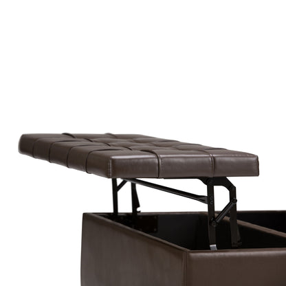 The Harrison Upholstered Coffee Table Storage Ottoman, shown in brown leather with a tufted, cushioned lid lifted to reveal interior storage and metal hinges, is displayed against a white background.