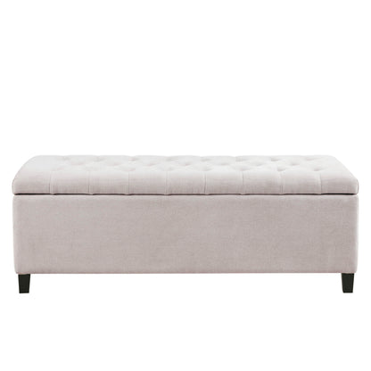 The Elegant Design Tufted Top, Soft Close Storage Bench is rectangular with light gray upholstery, a tufted top, and short black legs, shown against a white background.