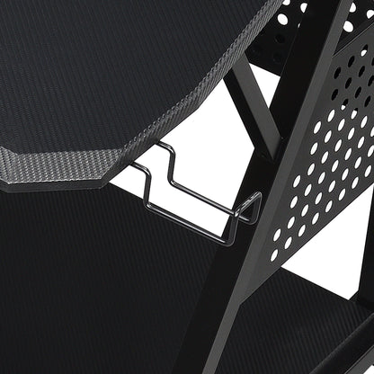 Close-up of the Willow - Versatile Music Desk, showcasing its black carbon fiber textured surface, built-in metal headphone holder, and perforated side panel for ventilation or design.