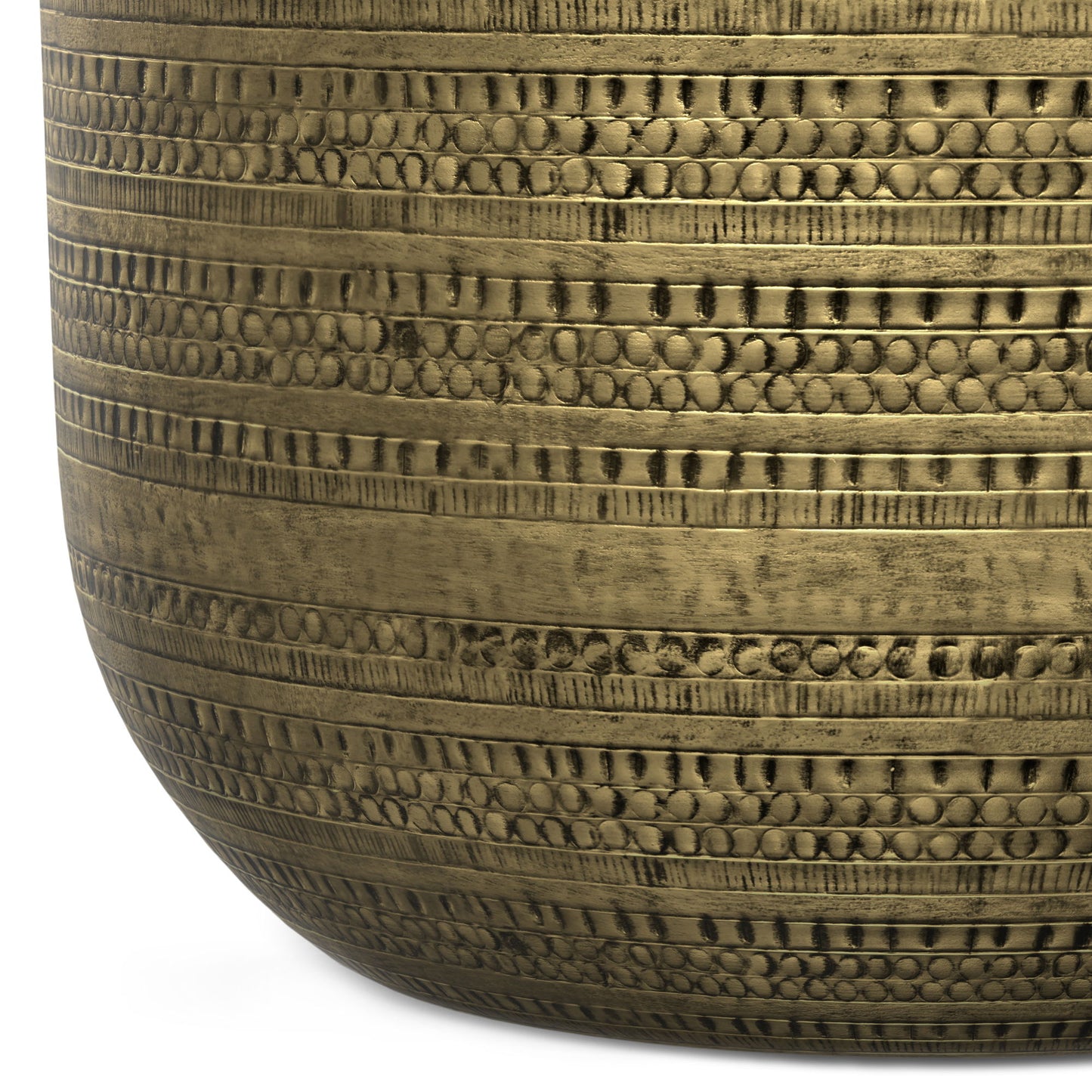 Close-up of the Johnsen Handcrafted Metal Coffee Table, featuring a brass-toned finish with intricate horizontal embossed patterns of alternating dots and lines.