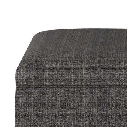 Close-up of the Owen Multifunctional Square Coffee Table Storage Ottoman, showcasing its textured gray fabric upholstery with visible stitching and a subtle pattern on the top and side.