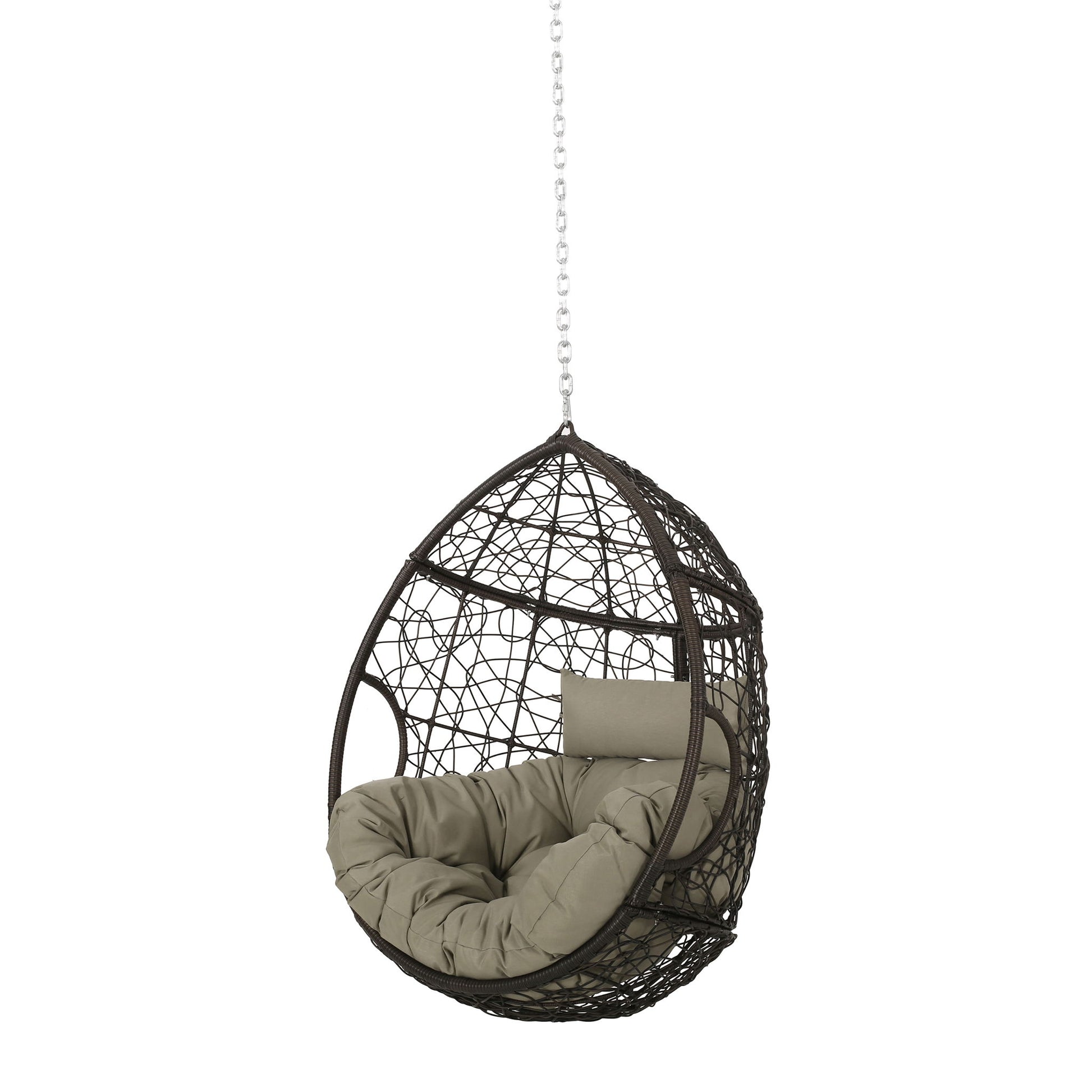 The Teardrop Hanging Chair features a woven dark brown design with a thick light beige cushion and pillow, suspended by an 8ft metal chain against a plain white background.