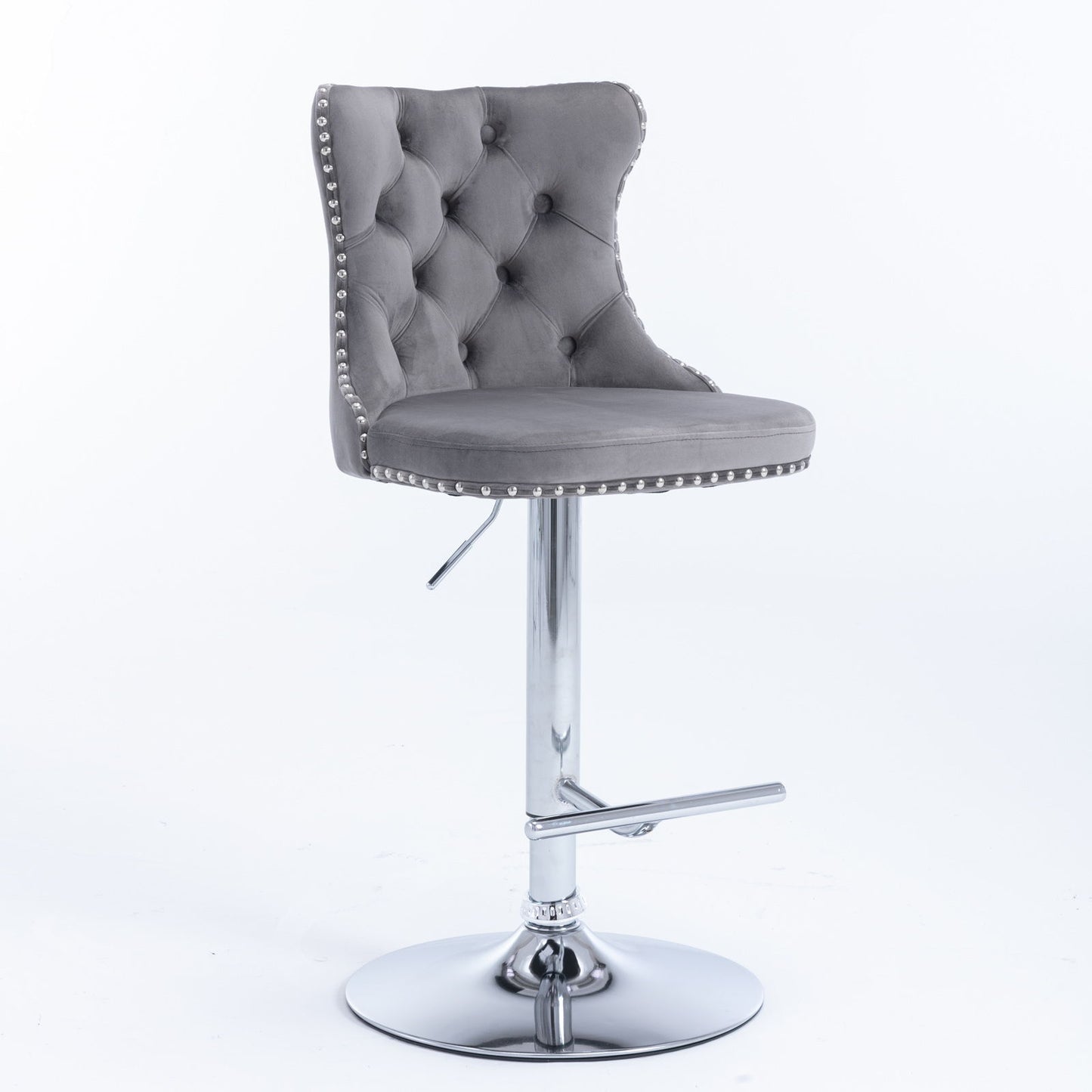 The Swivel Velvet Barstools, set of 2, feature tufted grey backs, chrome adjustable bases (25-33" seat height), round cushioned seats, silver nailhead trim, and footrests—perfect for home pubs or kitchen islands. Shown on a plain white background.