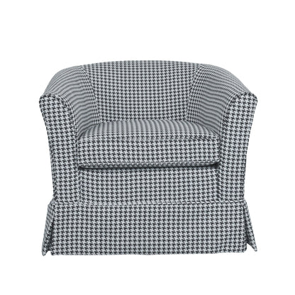 The Zeniqua Upholstered Velvet Swivel Chair with Loose Cover features a black and white houndstooth pattern, flared arms, and a skirted base, shown here from the front.