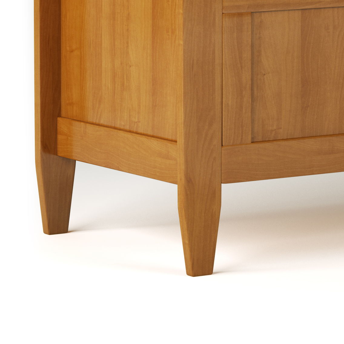 The image features the lower corner of the Brooklyn Handcrafted Entryway Storage Bench, showcasing its tapered legs and smooth light brown wood finish, set on a white floor.