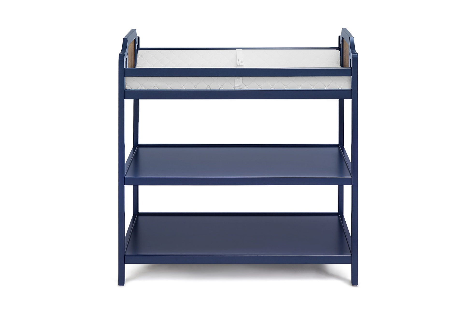 The Brees - Changing Table is a navy blue wooden table with two open shelves and a white cushioned changing pad on top, displayed against a plain white background.