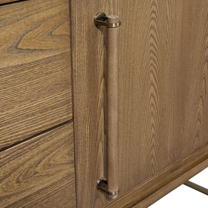 Close-up of the Metal Base Sideboard - Light Brown, showing a vertical cylindrical wooden handle with brass accents, a right-side door, and left-side drawers highlighting the natural wood grain pattern.