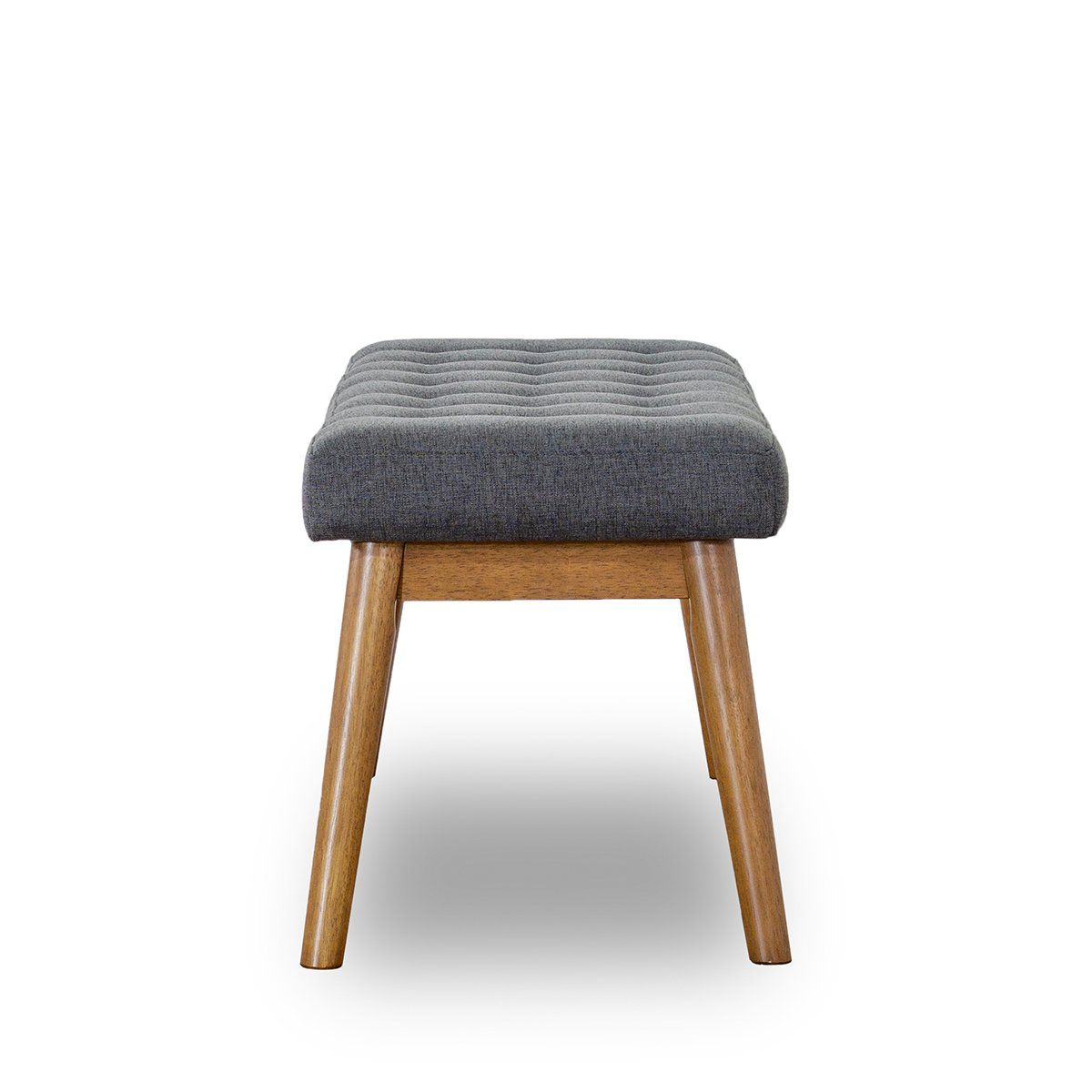 The Delilah Modern Bench features a cushioned, dark gray tufted seat and four angled wooden legs, displayed against a plain white background.