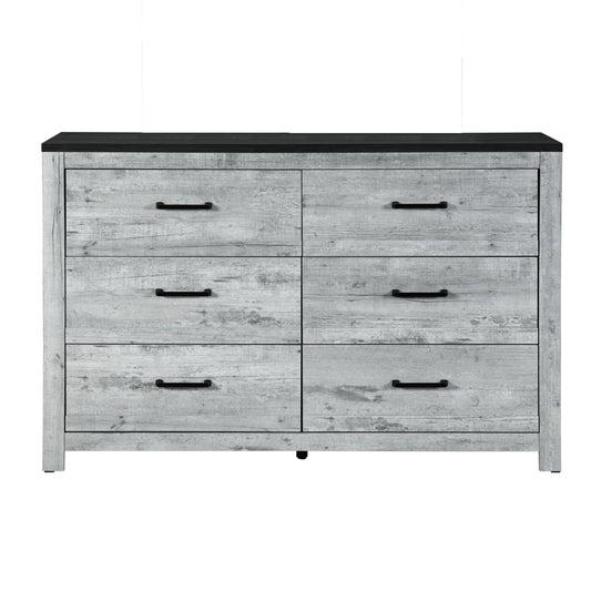 The Couch.com Kicks Dresser features six drawers, a gray wash wood construction, and sleek black handles for a rustic look.