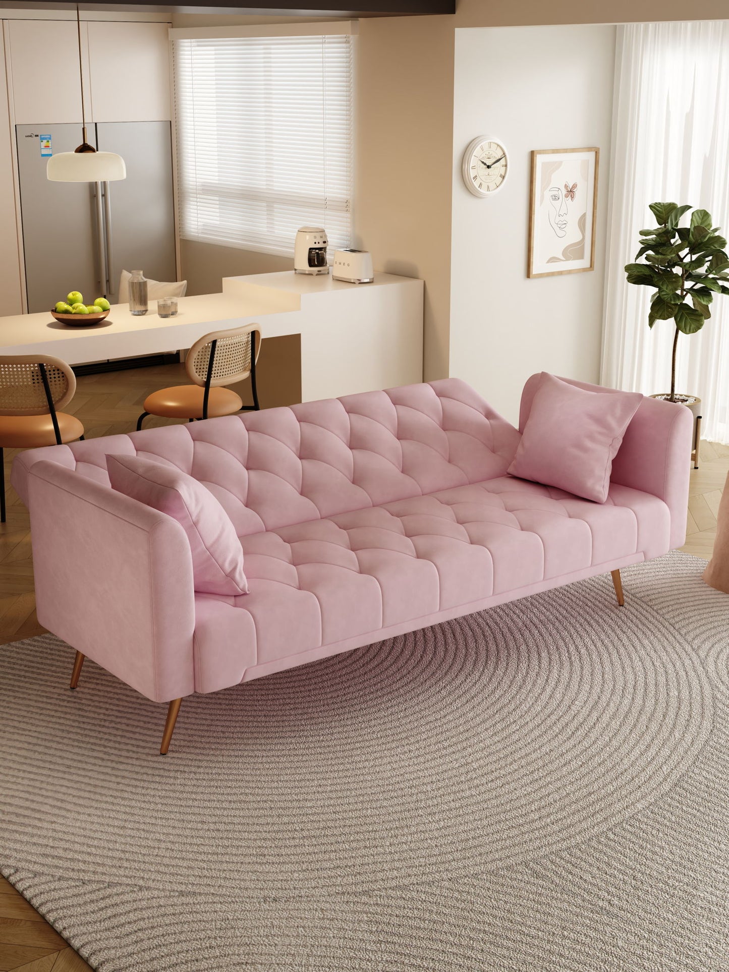 A modern living room features a Convertible Double Folding Living Room Sofa Bed with two cushions on a round textured rug, plus a kitchen with bar stools, a plant, wall art, clock, and natural light from large windows.