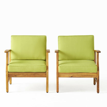 Two Perla Contemporary Club Chairs with water-resistant light green cushions are placed side by side on a plain white background. The chairs showcase simple, straight lines and a modern design.