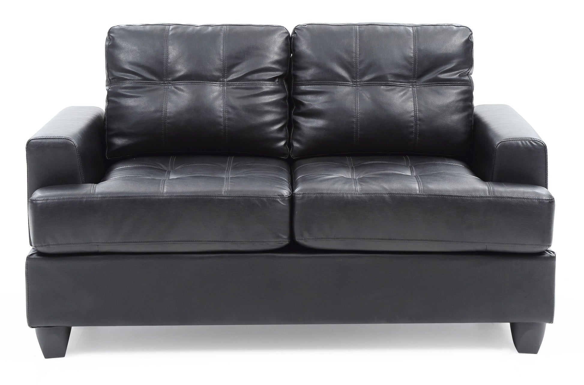 The Stylish Transitional Loveseat For Two features modern black leather, tufted cushions, wide armrests, and short black legs, shown against a white background.